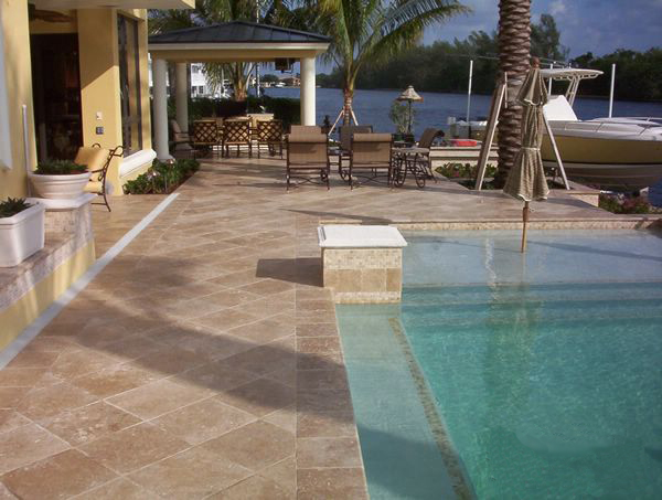 Travertine is a great material for installation around your pool